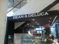 Dean and Delucca store signs