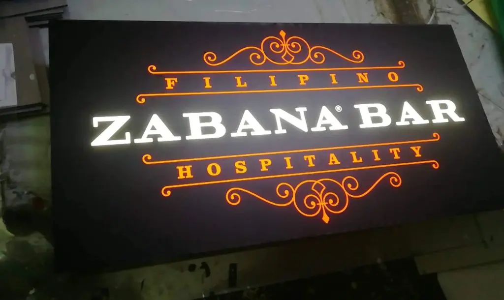 Illuminated bar signage for ZABANA BAR with orange accents, at Makati, by M&G Global Ads.