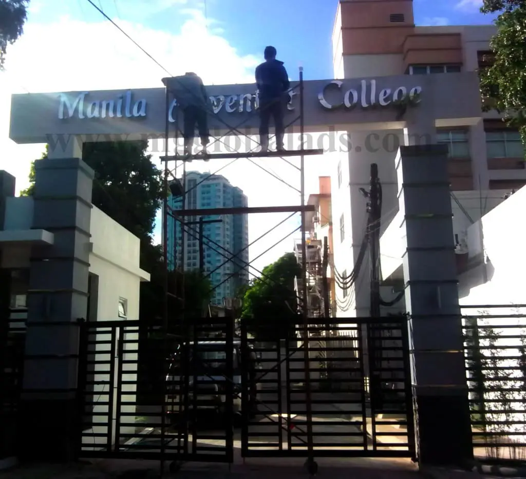 Building signage installation for Manila Adventist College in Quezon City, outdoor sign project by M&G Global Ads.