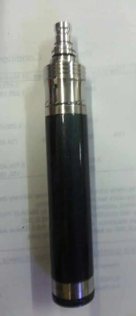 Indoor signage for vape store, black and silver device on printed paper, Makati location by M&G Global Ads.