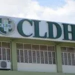 Outdoor building signage for CLDH with green and white logo in Makati by M&G Global Ads, above windows with metal bars.