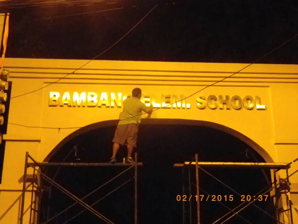 School archway signage for Bamban Elementary School installation in Makati at night by M&G Global Ads.