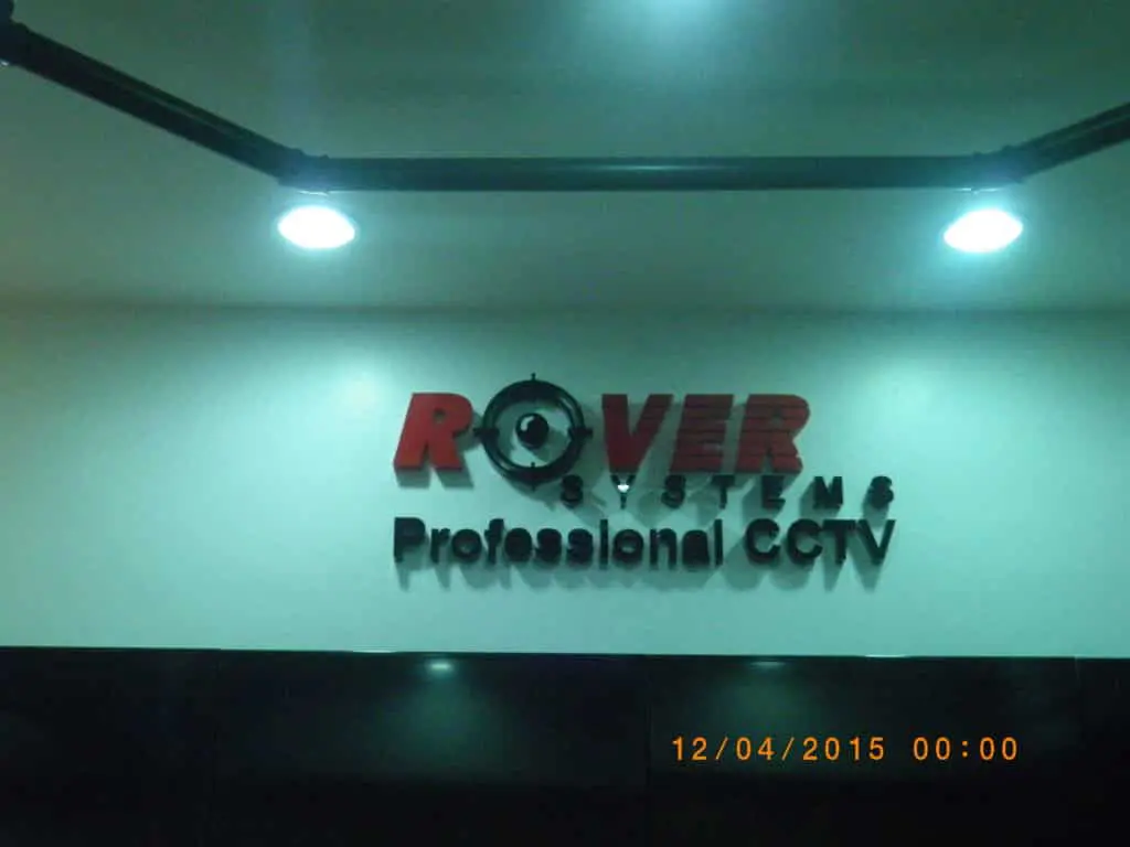 Indoor acrylic signage for ROVER SYSTEMS Professional CCTV, camera lens as O, in Makati office by M&G Global Ads.