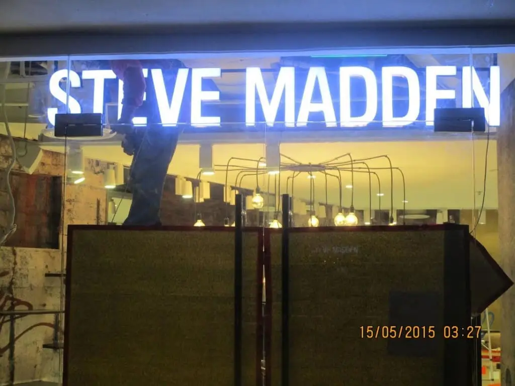 STEVE MADDEN outdoor signage installation in Makati with hanging lights and store displays by M&G Global Ads.