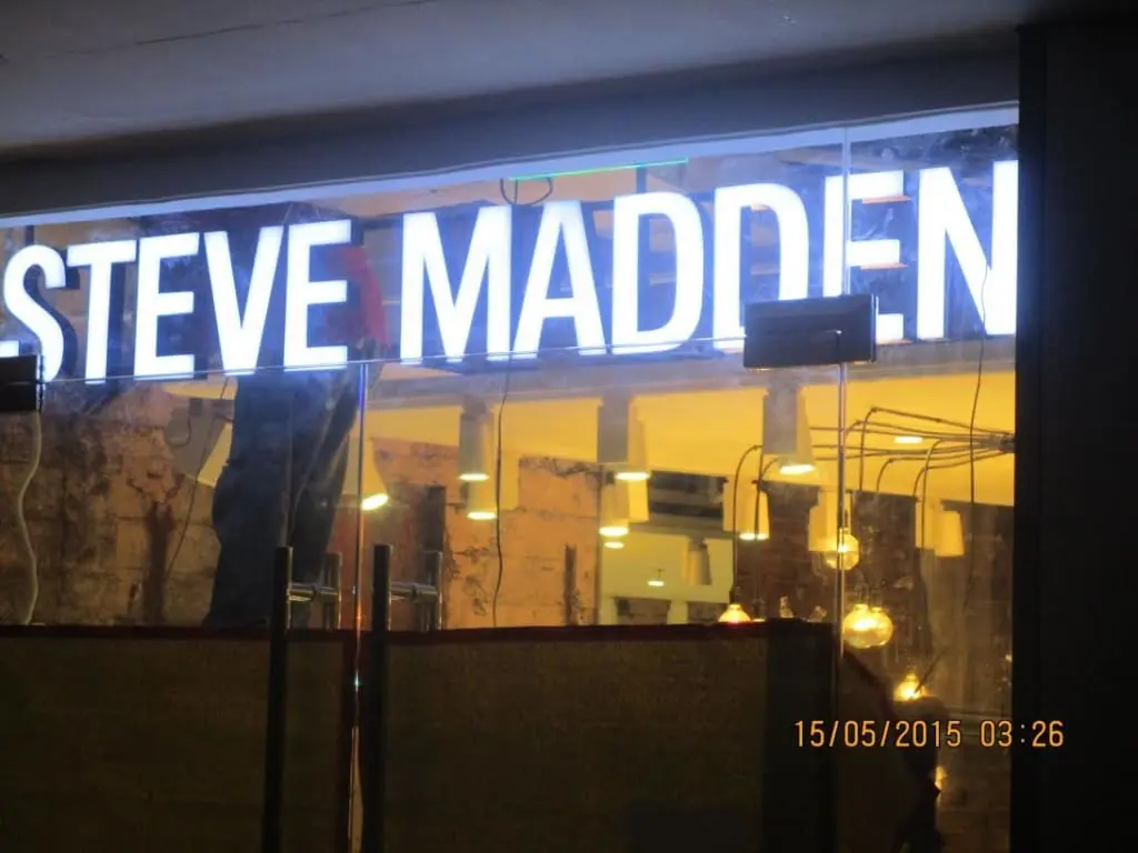 STEVE MADDEN illuminated outdoor signage, glass storefront, night view in Makati by M&G Global Ads.