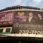 Roadside beauty clinic billboard signage for Dr. Anna Marie Montesa in Makati by M&G Global Ads. Smiling faces, bold promo text.