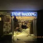 Steve Madden illuminated metallic signage installation in progress at a Makati store by M&G Global Ads.
