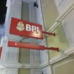 Red acrylic BPL signage with Kidzania Manila logo on yellow building in Ortigas, featuring white columns by M&G Global Ads.