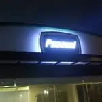 Illuminated acrylic building signage for Pascual in Makati at night, with glass windows, by M&G Global Ads.