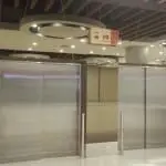 Metal building restroom signage with male and female symbols, UG in Quezon City office interior by M&G Global Ads.