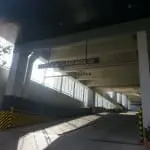 LED vertical clearance signage, parking garage entrance in Ortigas with caution stripes, by M&G Global Ads.