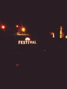 LED signage FESTIVAL with lit crown, night scene and streetlights in Ortigas by M&G Global Ads.