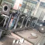 Fabrication of custom metal signage in an industrial workshop in Quezon City, with tools and materials by M&G Global Ads.