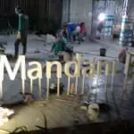 Building signage installation for Mandan Bay, metallic sign, at night in BGC, by M&G Global Ads.