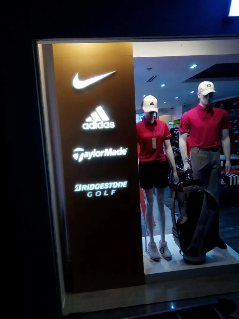 LED signage panel with Nike, Adidas, TaylorMade, Bridgestone Golf logos in a Makati store display by M&G Global Ads.