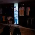 Vertical LED signage for Nike in a clothing store, golf shirts display, Ortigas. Glowing sign with golfer. By M&G Global Ads.