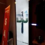 Backlit Adidas LED signage with Dustin Johnson DJ letters in a Makati store, red SALE sign. By M&G Global Ads.