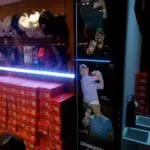 Bridgestone Golf LED signage display with orange shoe boxes and golf hats in Makati store by M&G Global Ads.