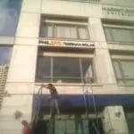 Acrylic signage for PHILERGY GERMAN SOLAR client installed on building facade in Makati, Metro Manila by M&G Global Ads.