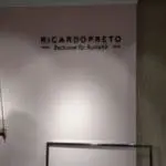 LED signage for Rustans store, featuring RICARDO PRETO, on a pale pink wall in Makati by M&G Global Ads.