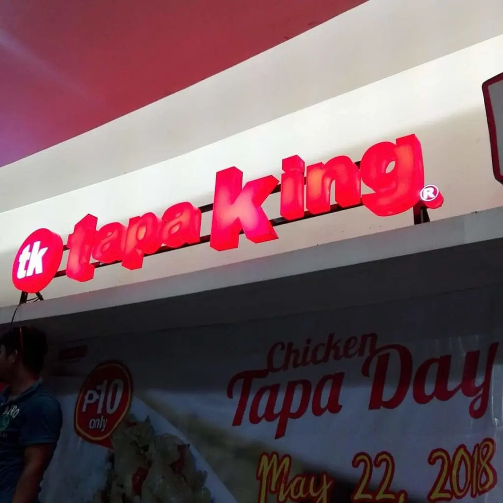 Tapa King metallic signage and Chicken Tapa Day promo banner in Quezon City, by M&G Global Ads.