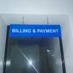 Indoor billing and payment sign hanging by chains in an office lobby, Ortigas location, by M&G Global Ads.