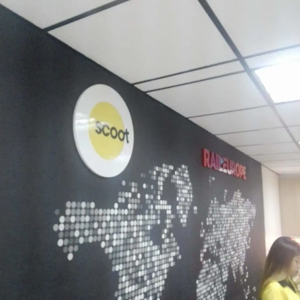 Indoor office signage for Scoot and Rail Europe with world map design in Makati by M&G Global Ads.