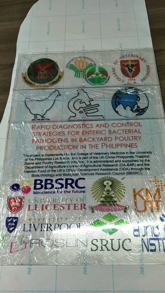 Laminated poster signage for university clients in Makati with logos and research title, by M&G Global Ads.