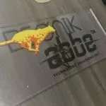 Acrylic logo signage for DESIGN abbe TECHNOLOGY SOLUTIONS INC., displayed in Ortigas, by M&G Global Ads.