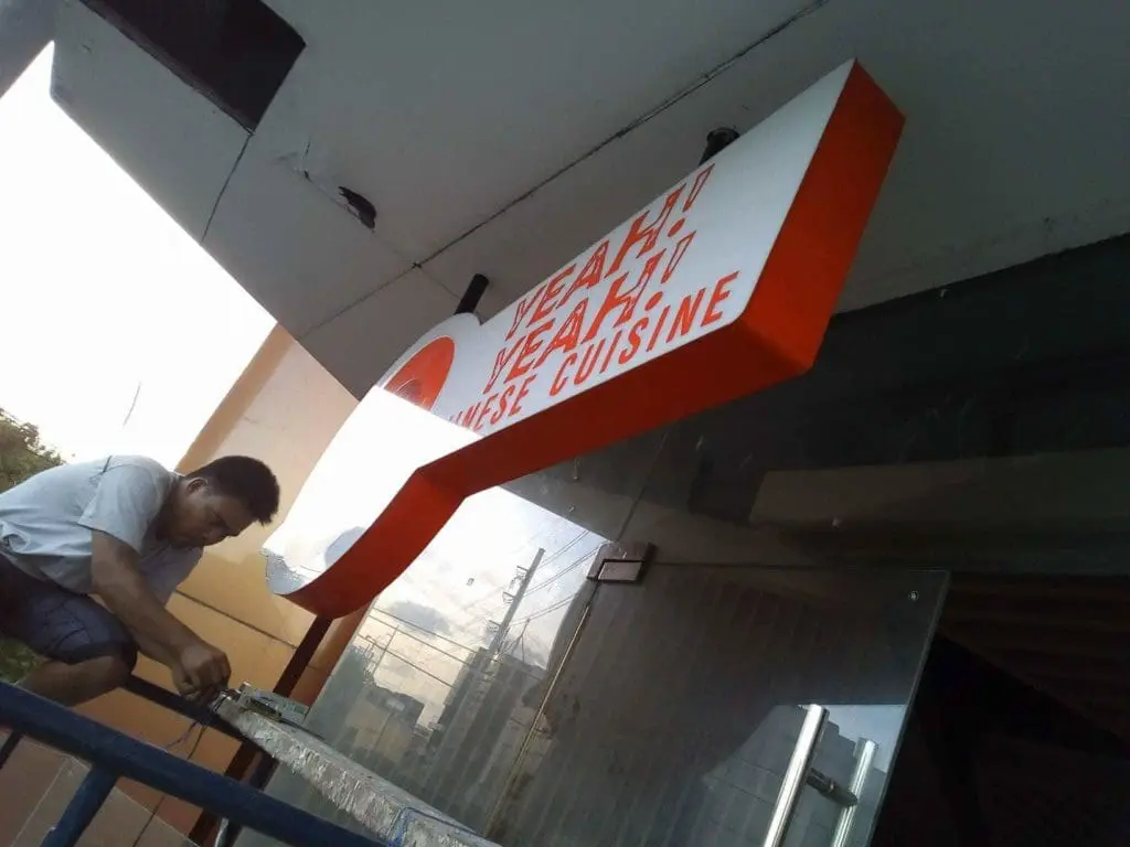 Red and white LED signage for YEAH! YEAH! YEAH! JAPANESE CUISINE in Makati installation by M&G Global Ads.