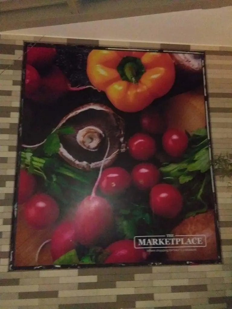 THE MARKETPLACE indoor poster signage with fresh vegetables, store logo, and branding in Quezon City by M&G Global Ads.