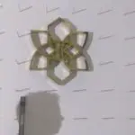 Vertical metallic office signage with decorative geometric wall art in Makati, white wall background by M&G Global Ads.