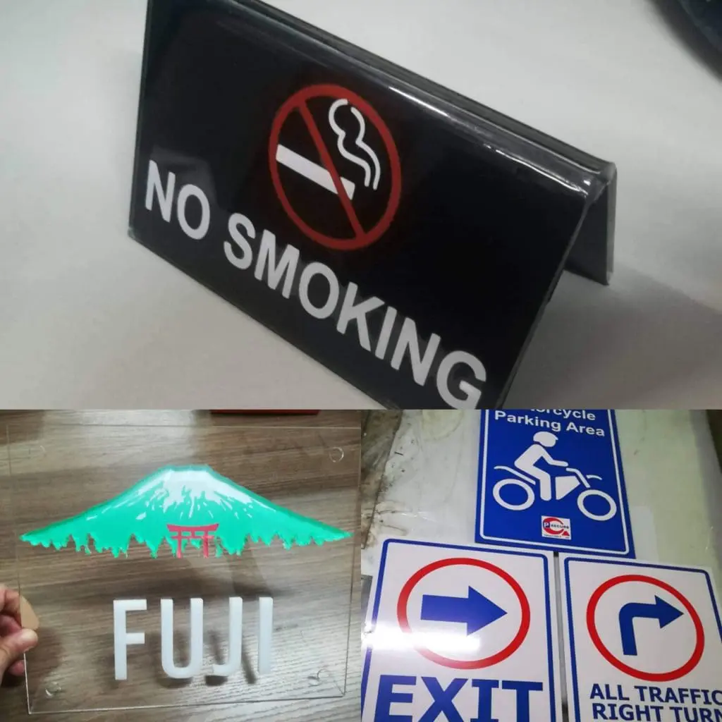 No Smoking sign, Mount Fuji building signage, motorcycle parking sign, blue traffic signs in Ortigas by M&G Global Ads.