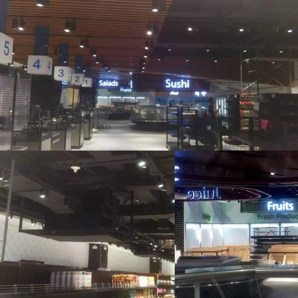 Supermarket indoor signage for Salads, Sushi & Fruits food counters, empty lanes and shelves in BGC by M&G Global Ads.