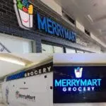Acrylic and metallic exterior signage for MerryMart Grocery in Quezon City, grocery bag logo and blue lighting by M&G Global Ads.
