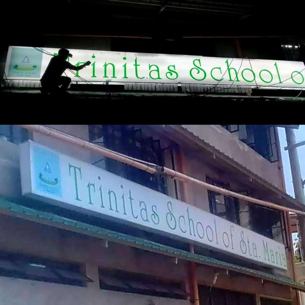Trinitas School of Sta. Maria acrylic outdoor signage installation in Quezon City; day and night views by M&G Global Ads.