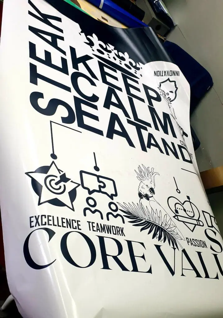 Building signage poster for office in Quezon City, with “KEEP CALM AND SEAT” and core values, by M&G Global Ads.