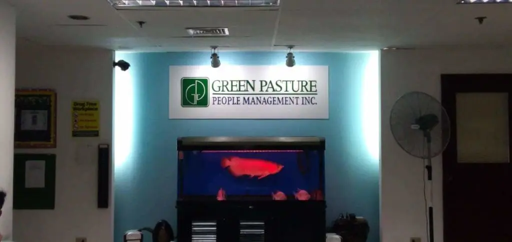 Metallic office lobby signage for Green Pasture People Management Inc. in Makati, well-lit display by M&G Global Ads.