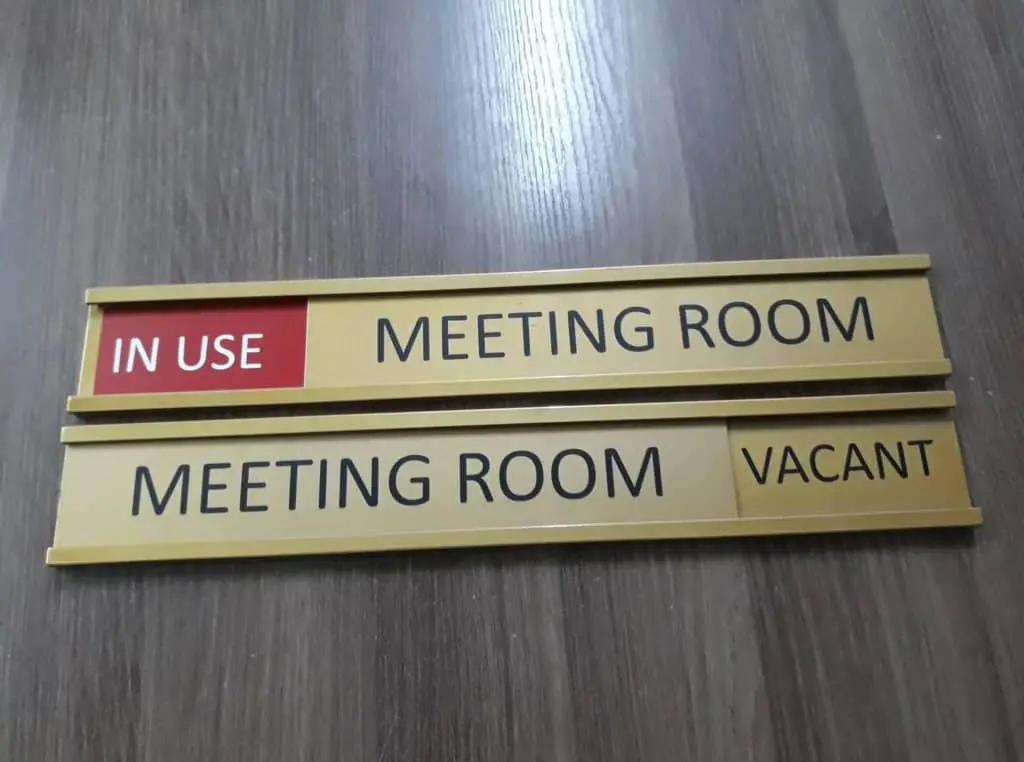 Metal meeting room door signs IN USE & VACANT for offices in Makati by M&G Global Ads.
