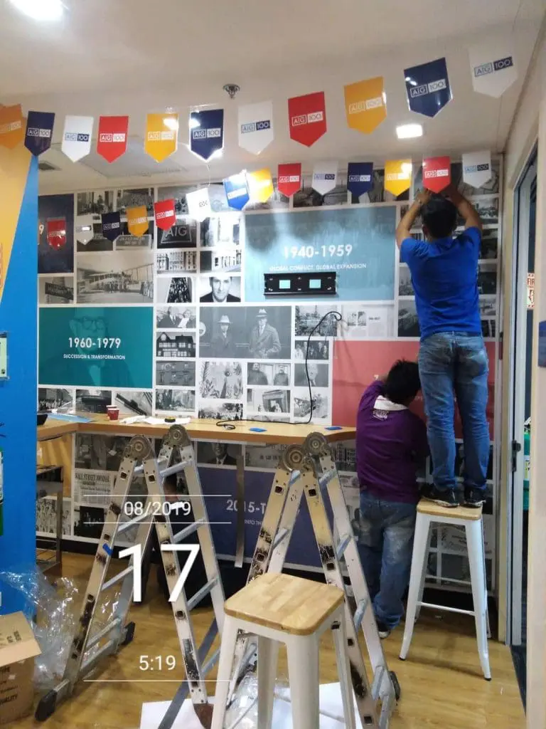 Acrylic signage with decade panels and photo collage, wall installation in Quezon City by M&G Global Ads.