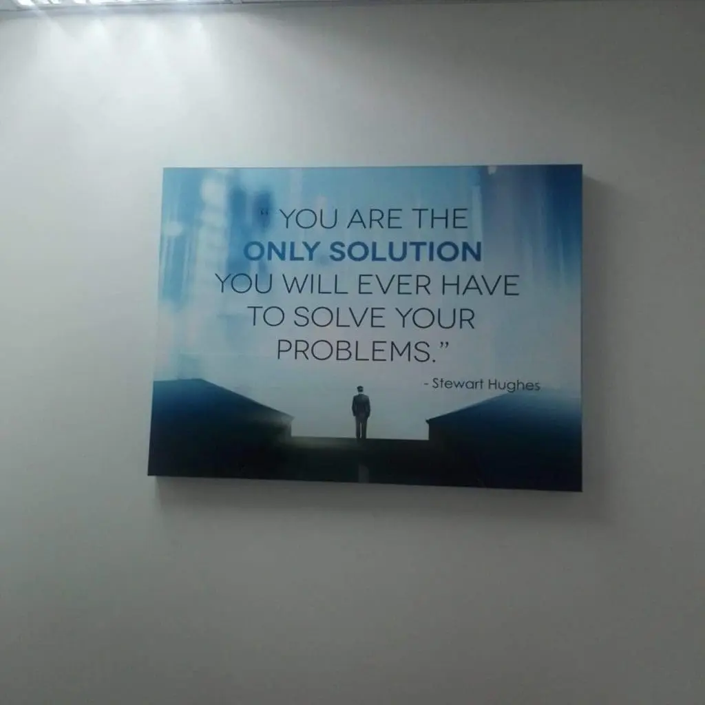 Indoor framed poster signage for motivational quotes, Stewart Hughes, in Makati, with silhouette art—by M&G Global Ads.