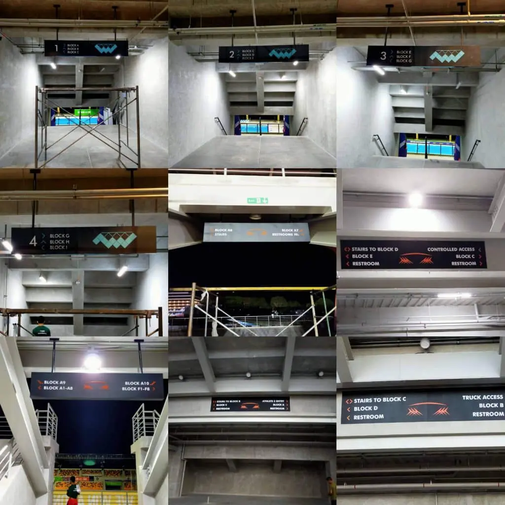 Acrylic directional and stadium signage for seating and restrooms at a concrete venue in Quezon City by M&G Global Ads.