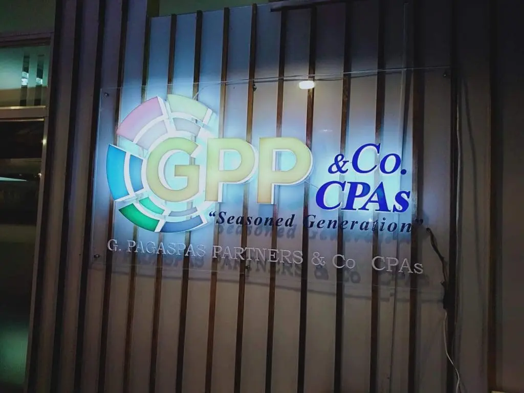 Illuminated acrylic signage for G. Pagaspas Partners & Co. CPAs in Makati by M&G Global Ads, with colorful logo and tagline.