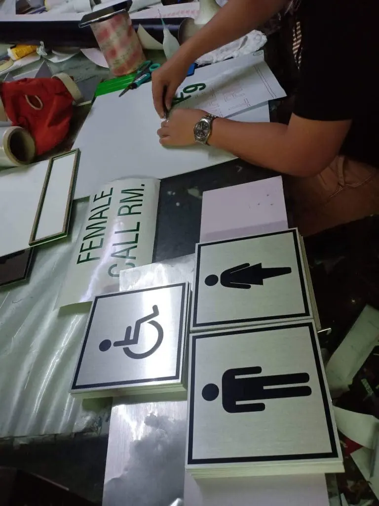 Acrylic restroom and accessibility indoor signage assembly in Quezon City, including FEMALE CALL RM., by M&G Global Ads.