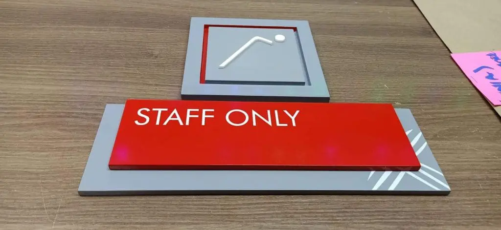 Acrylic STAFF ONLY indoor sign with white text, gray backing, raised symbol in Mandaluyong by M&G Global Ads.