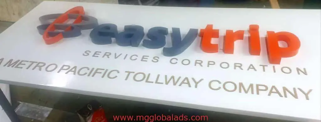 Outdoor building signage for Easytrip Services Corporation at Quezon City in blue, orange, and gold by M&G Global Ads.