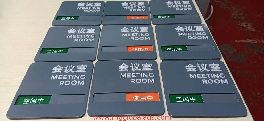 Meeting room signage, metallic indoor signs with Chinese & English text, in Makati. Green & orange status labels. by M&G Global Ads.