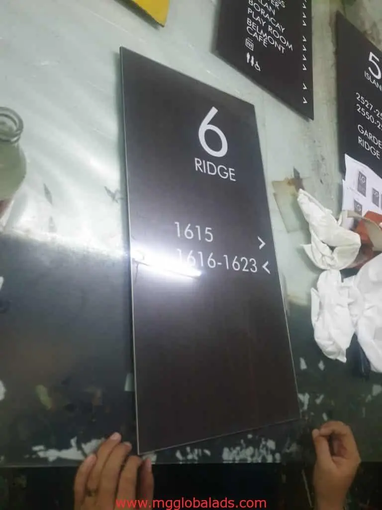 Indoor directional signage for residential building, 6 RIDGE, with arrows and unit numbers in Makati by M&G Global Ads.