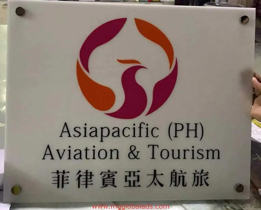 Indoor metallic signage for Asiapacific (PH) Aviation & Tourism in Makati with red orange bird logo by M&G Global Ads.