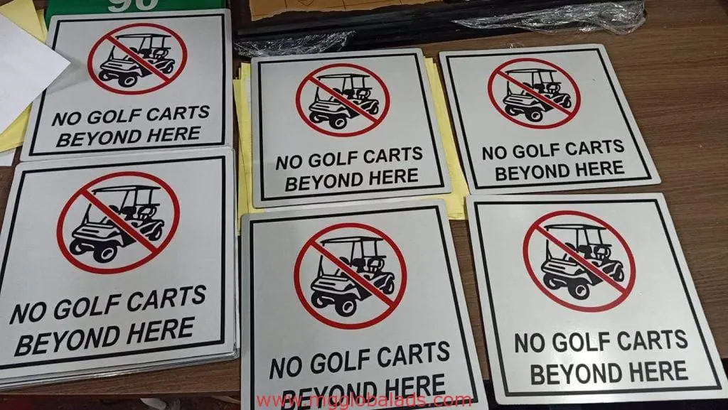 Outdoor no golf cart metal signage for private property in Makati, with bold symbols and text by M&G Global Ads.